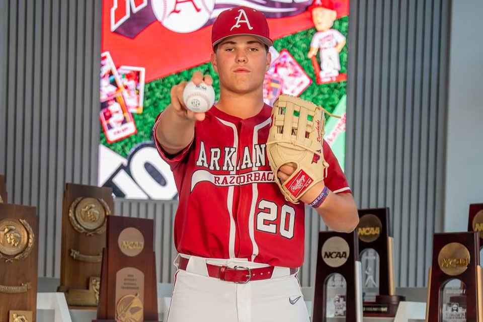 Mark Brissey celebrating his signing with Arkansas Razorbacks