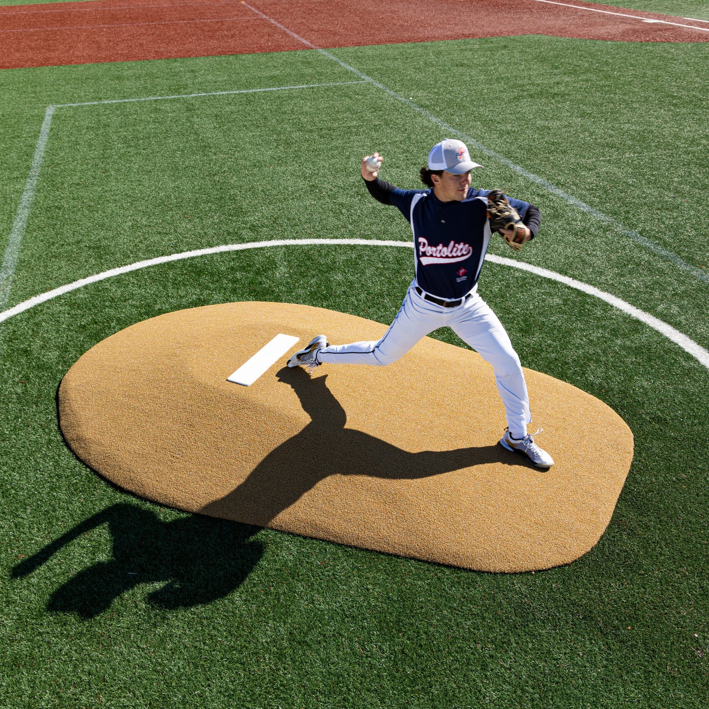 Pitcher using a 6" One-Piece Game Mound