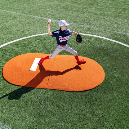 Pitching on a clay colored 6" Two-Piece Game Mound