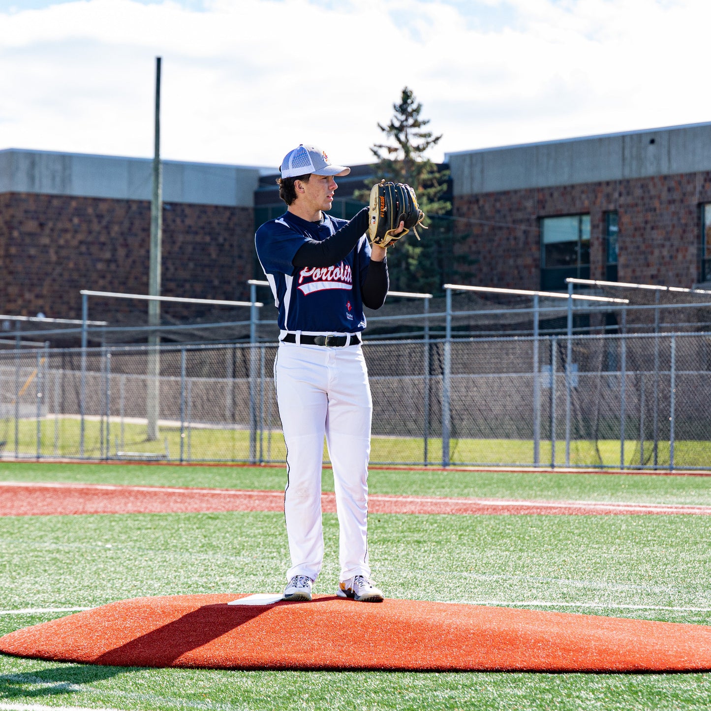 Pitcher Pitching on a Portolite Mound