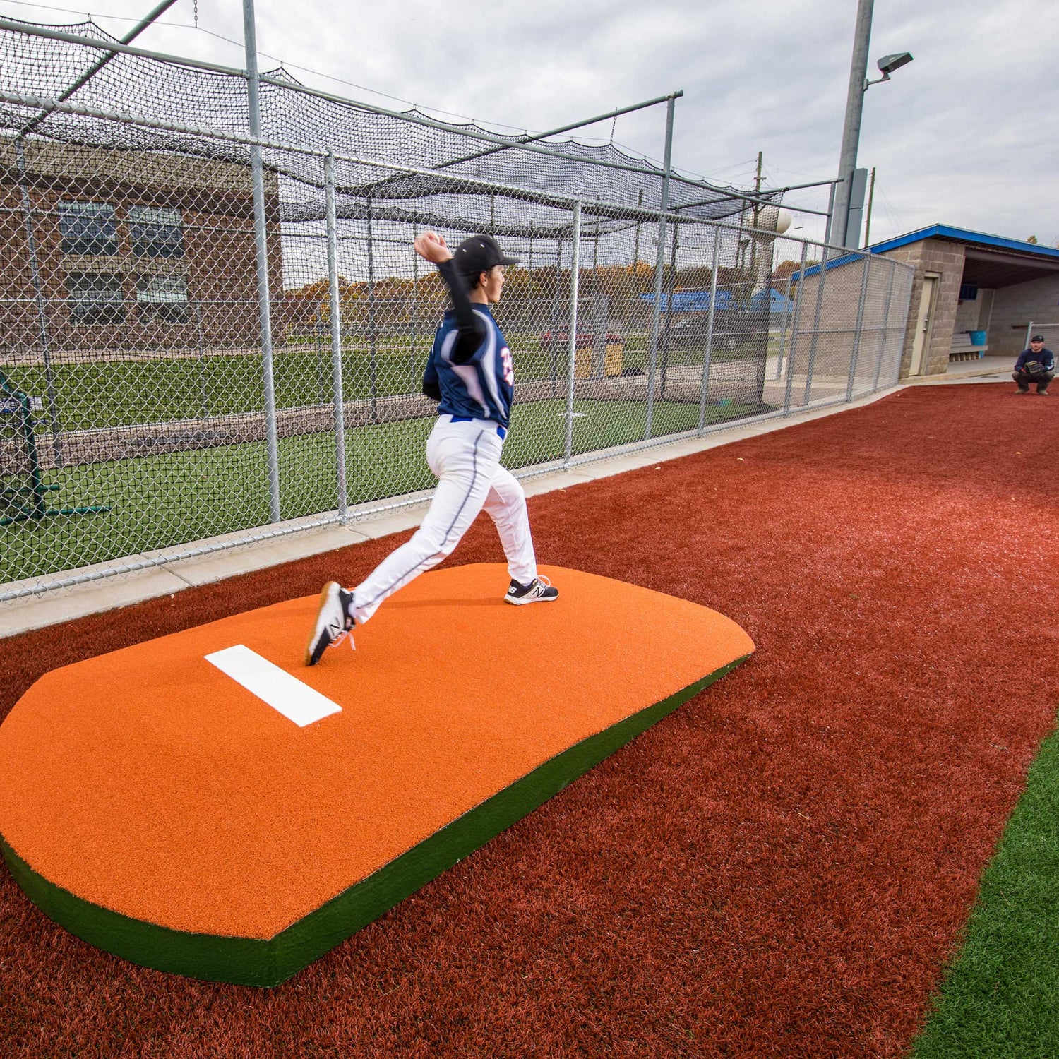 Pitching using a 1 piece practice mound outside