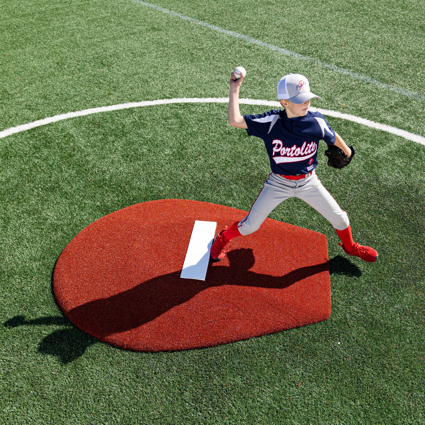 Pitcher using a 6" Stride Off Game Mound